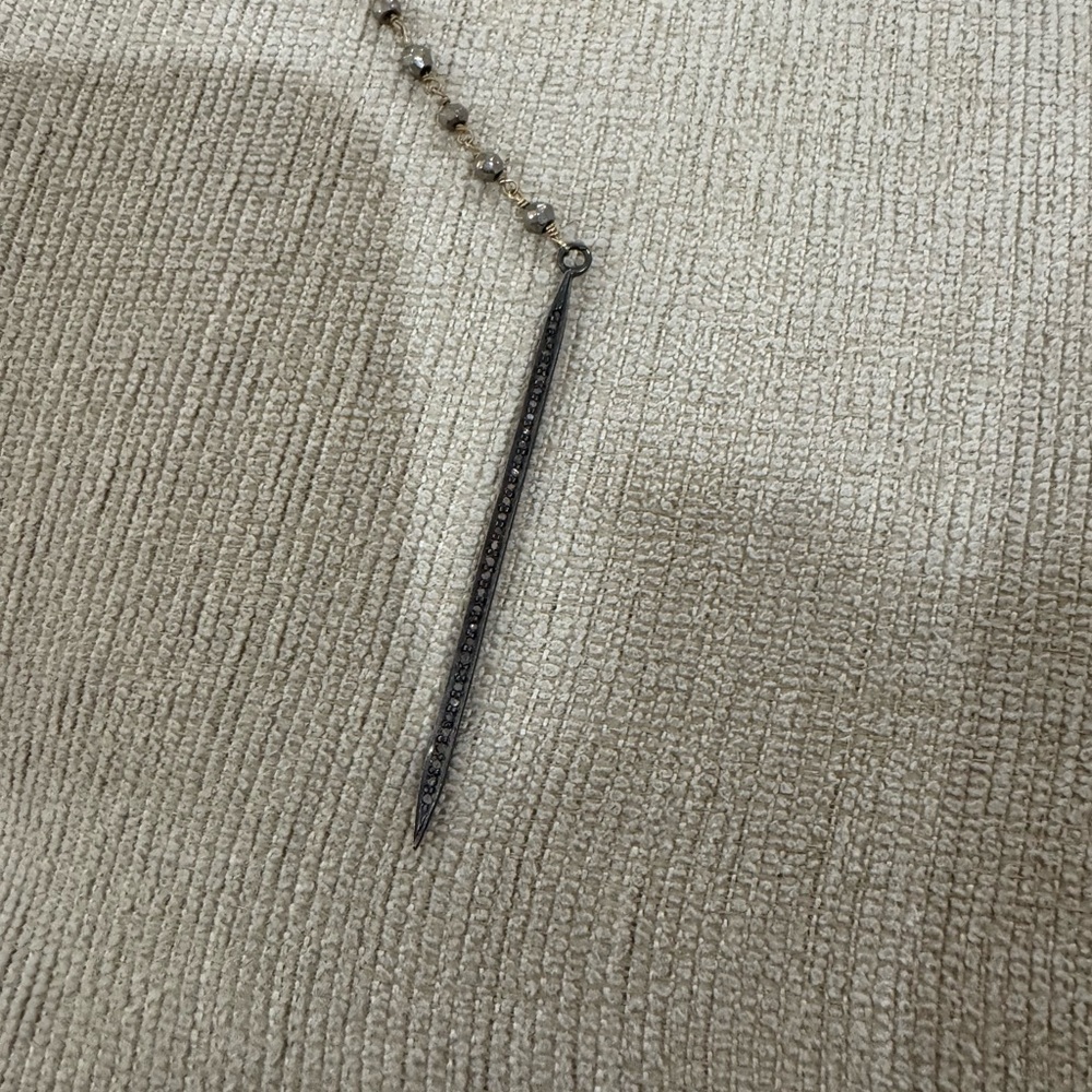 Silver beaded necklace with pedant